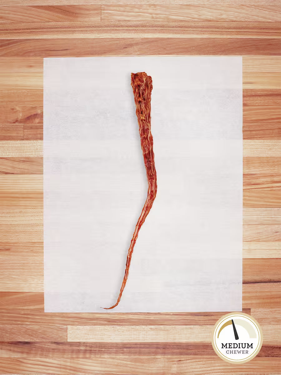 Farm Hounds beef tail chew for dogs, natural and healthy dog treat with a visible beef tail in the image.