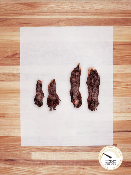 Farm Hounds hairy rabbit chews and hides, natural chew treats for small pets, showcasing textured hairy rabbit hides.