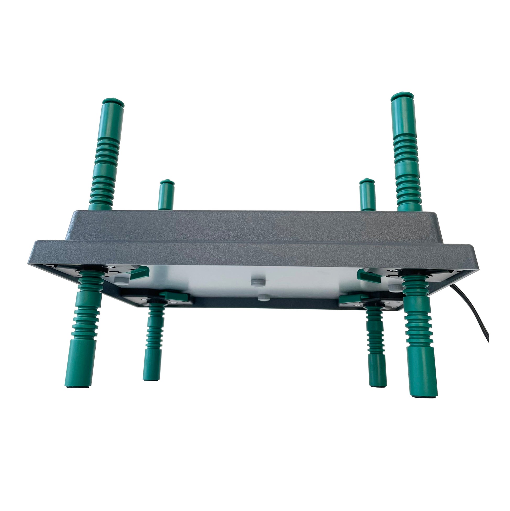 The My Pet Chicken Farmight Chick Brooder Heater Plate, shown from below, is gray and rectangular with four green antennas and a black cable extending from the right side. The heater offers adjustable height and comes in 3 size options.