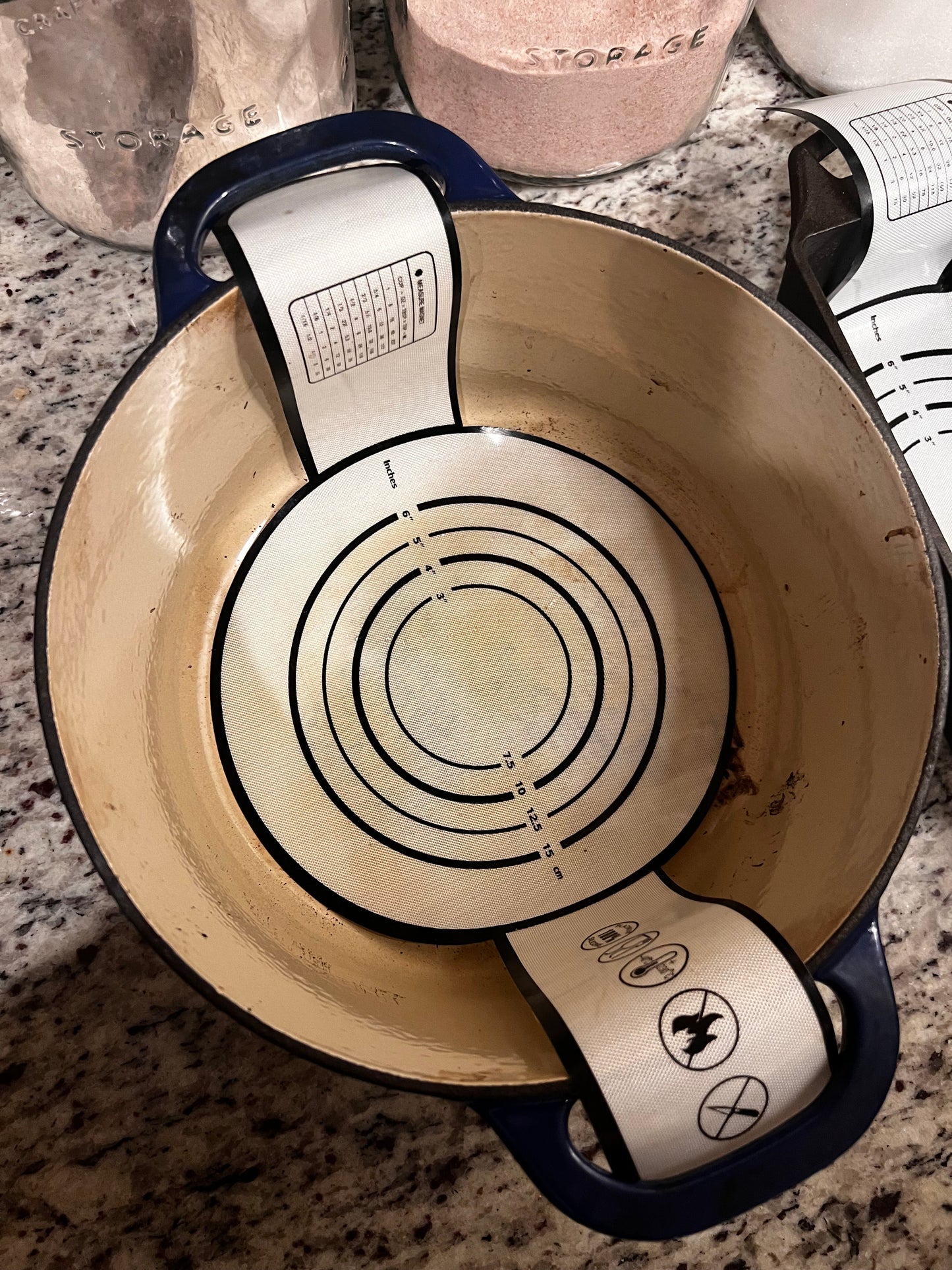 Five Oaks Farm Dough Sling for baking, featuring a sturdy fabric strap and metal clips for easy dough handling.