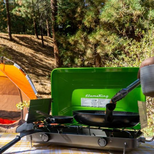 Flame King 2 Burner Portable Propane Camping Stove Grill with metal burners and control knobs for outdoor cooking.