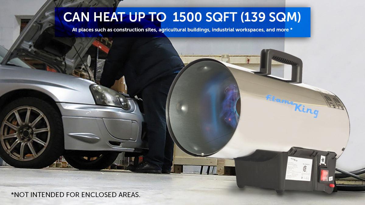 Portable Flame King forced air propane heater with 60,000 BTU for outdoor camping, featuring a tank and sturdy design.