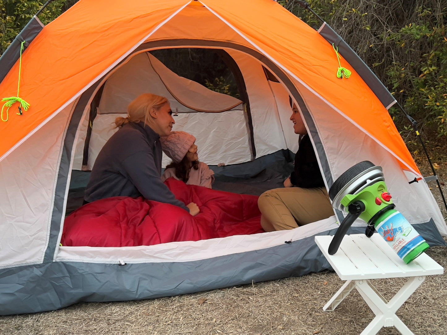 Portable Flame King propane outdoor camping heater with Piezo electric start, compact design, and safety features for outdoor warmth.