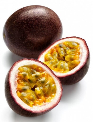 Purple Passion Fruit Tree from Florida Plants Nursery with vibrant purple fruits and lush green foliage.