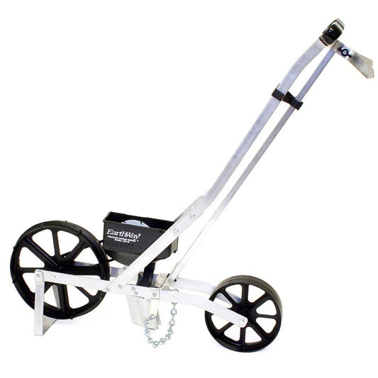 Earthway Seeder for seeding and digging, shown in garden setting, by Papaws Garden Supply LLC, highlighting its durable design.