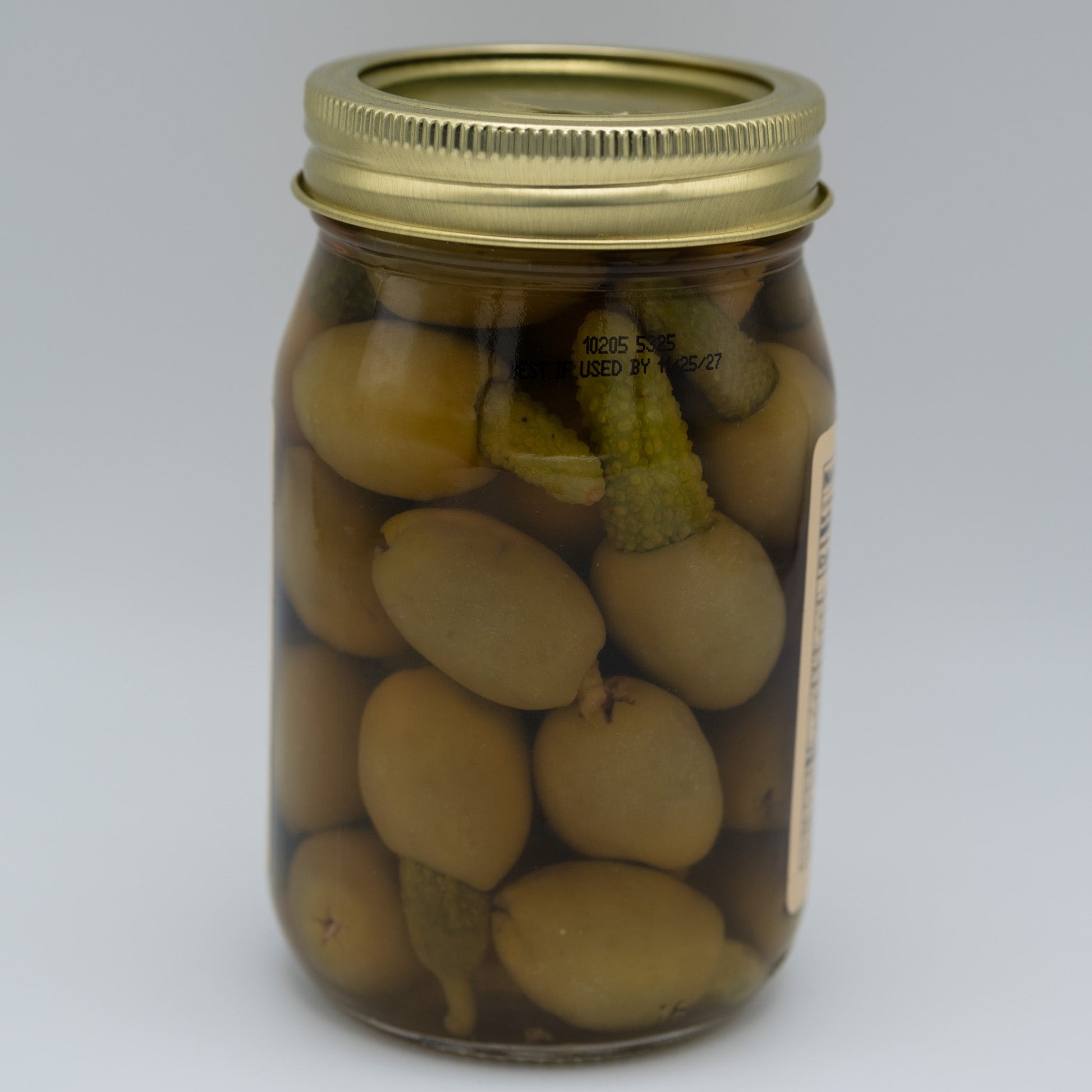 Canned Gherkin Stuffed Olives in 16oz jar by Amish Country Store, showing green olives filled with pimentos.