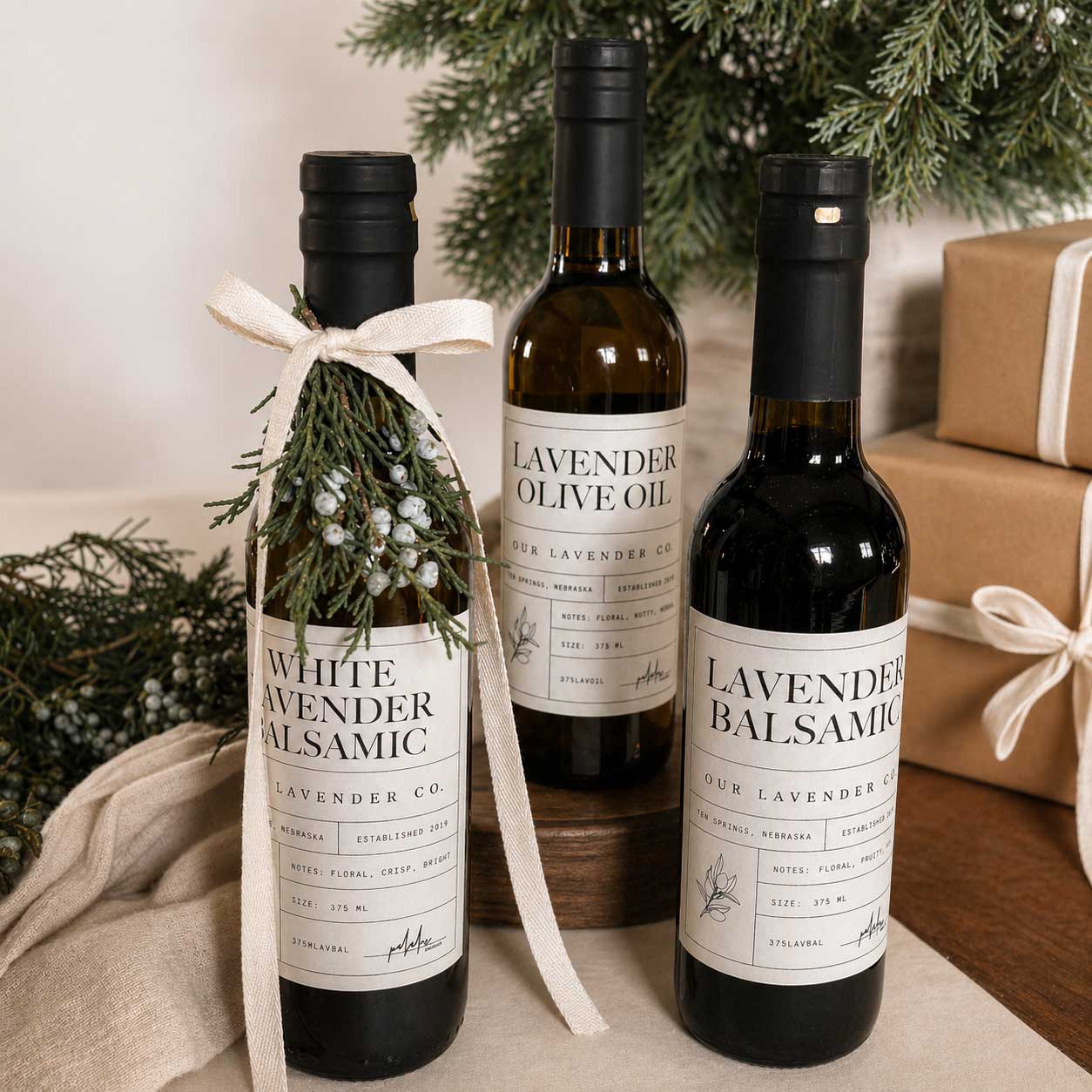 Lavender-infused olive oil in a 12.7 oz bottle with fresh lavender sprigs, showcasing the flavorful culinary oil from Our Lavender Co.