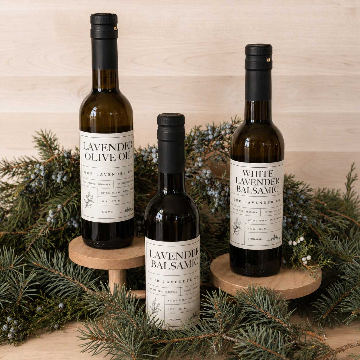 White Lavender Balsamic Vinegar from Our Lavender Co, 12.7 oz, with a clear bottle and a fresh lavender garnish.