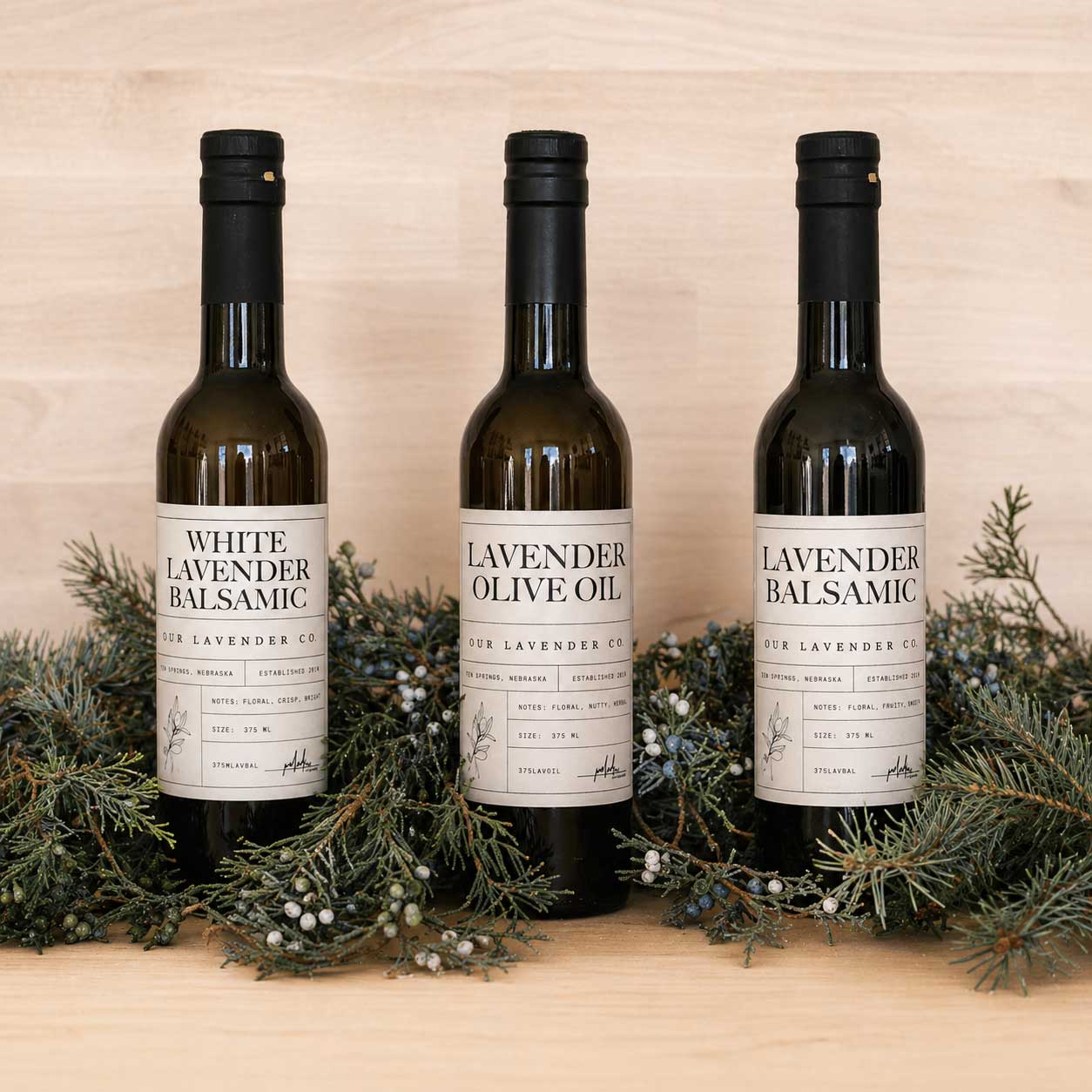 Lavender Balsamic Vinegar from Our Lavender Co, 12.7 oz bottle, featuring a dark balsamic liquid in a clear glass bottle.