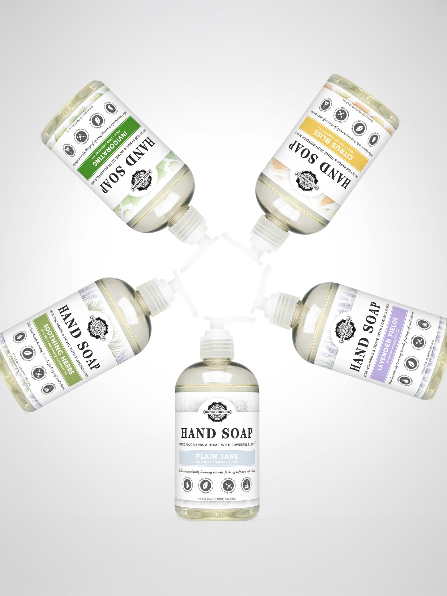 Five bottles of Rustic Strength Hand Soap | Citrus Bliss with different colored labels and pump dispensers arranged in a circular pattern on a white background with a subtle gradient.