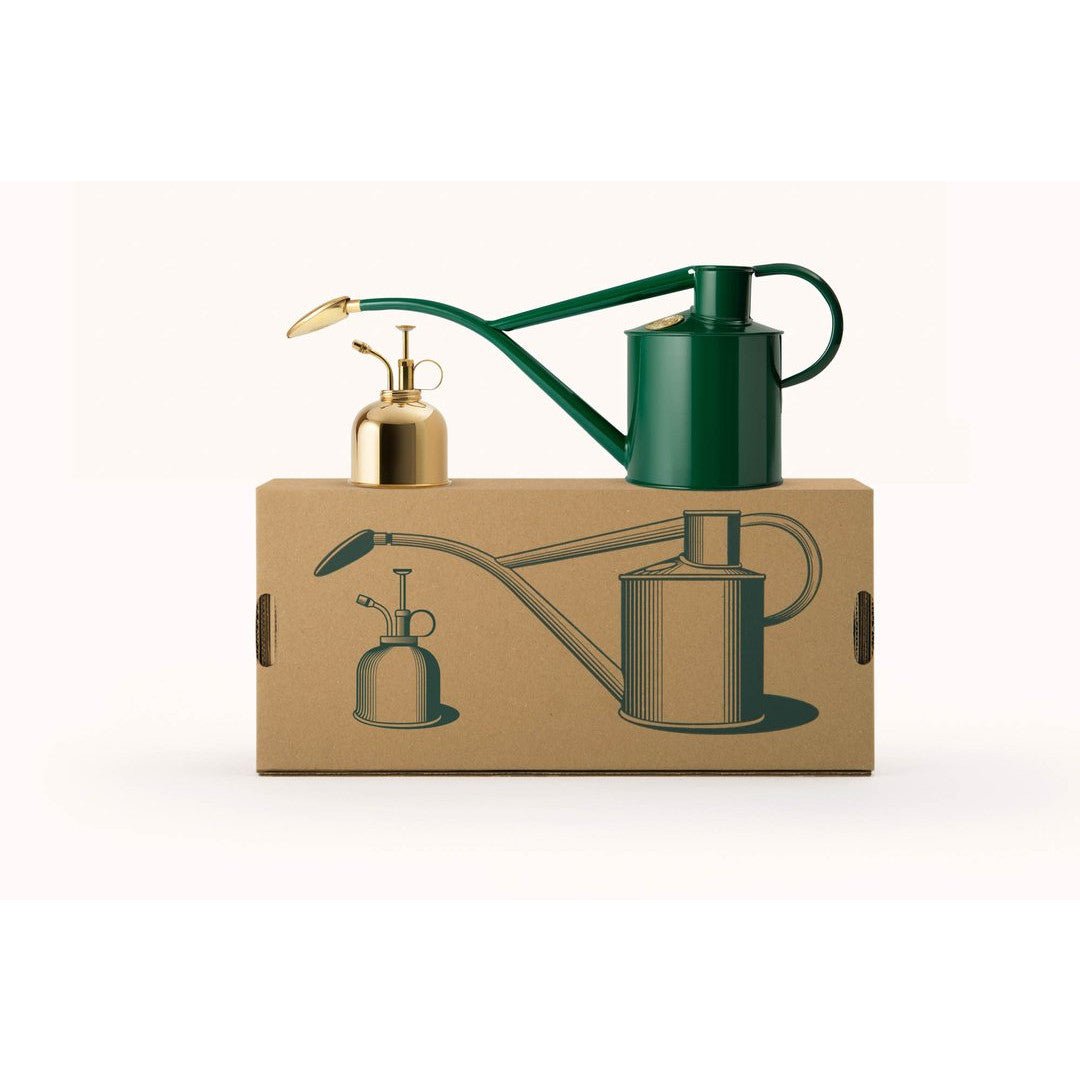 The Celtic Farm Haws Gardener Gift Set—Rowley Ripple & Spritzer—is displayed atop a box featuring illustrations of the green metal watering can and small brass spritzer.