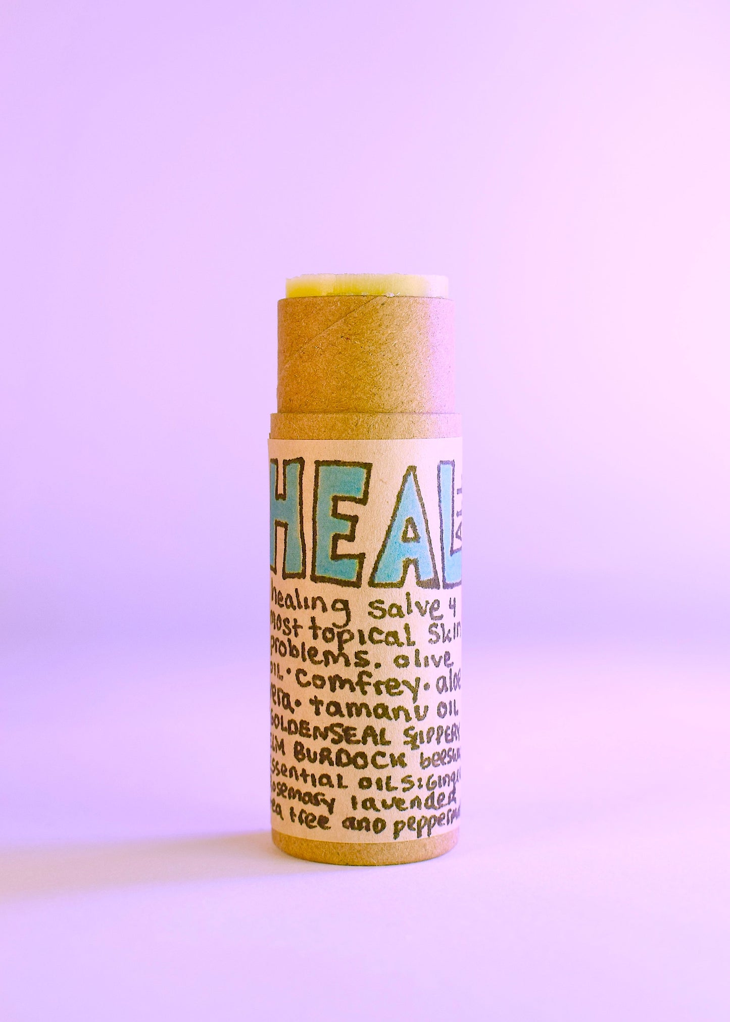 Plant Makeup Heal All Balm in a jar, showing the natural herbal-infused skincare product with a smooth, creamy texture.
