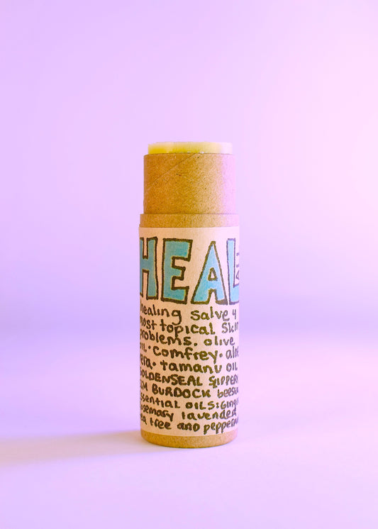 Plant Makeup Heal All Balm in a jar, showing the natural herbal-infused skincare product with a smooth, creamy texture.