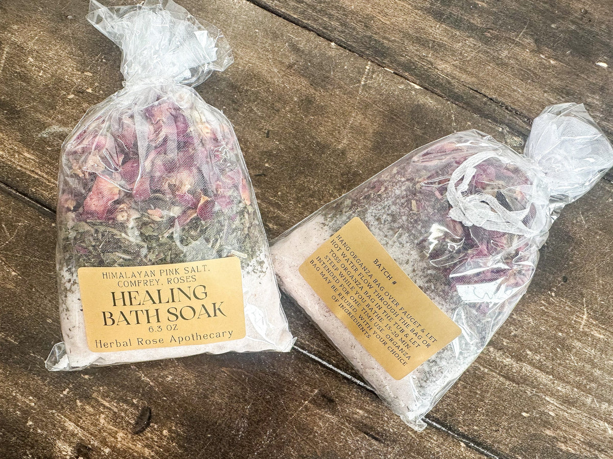 Herbalroseapothecary herbal bath soak in a jar, with dried herbs and flowers for relaxing, natural bath therapy.