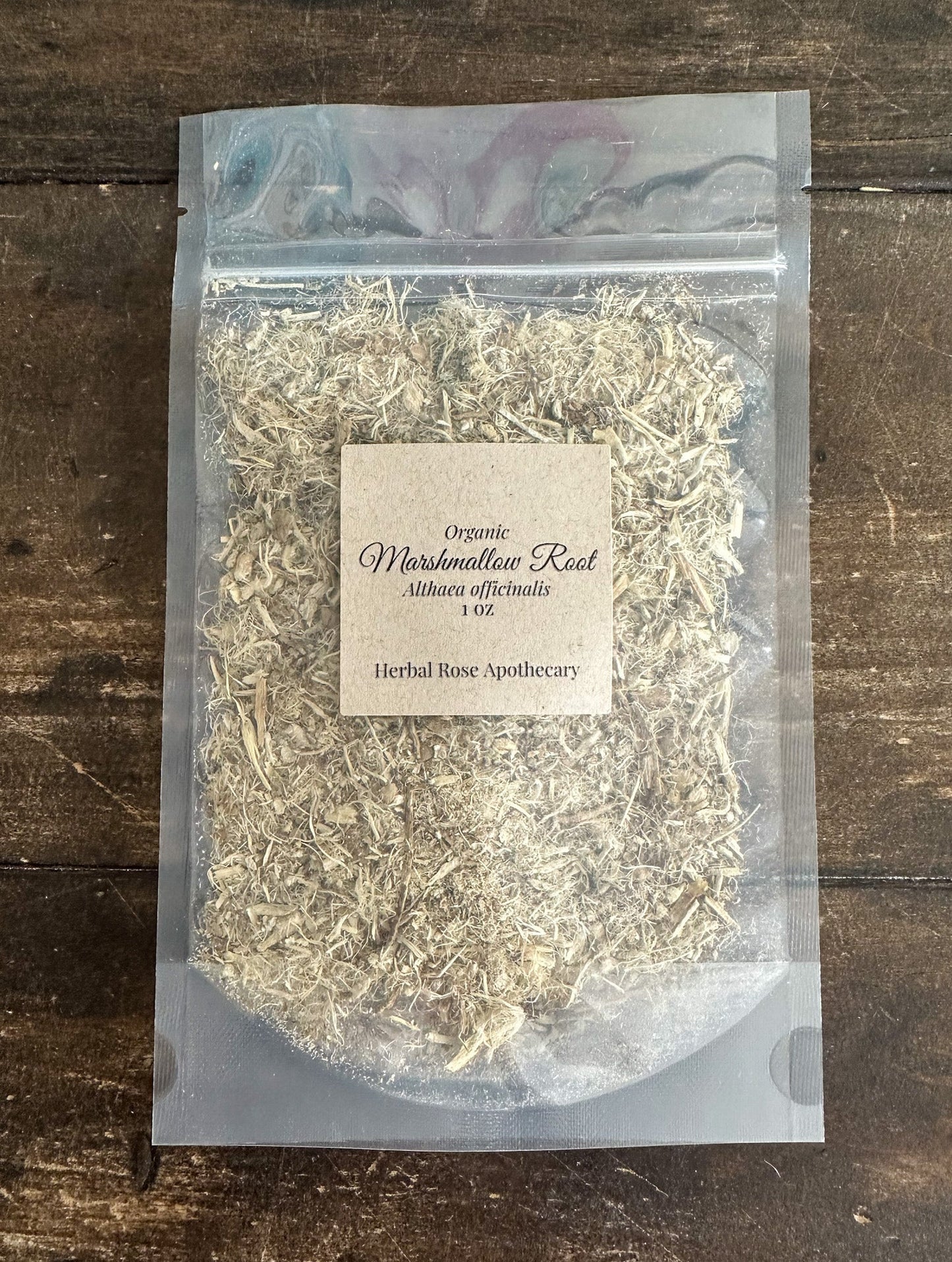 Organic marshmallow root in 8g package from Herbal Rose Apothecary, dried and cut for herbal tea or supplement use.