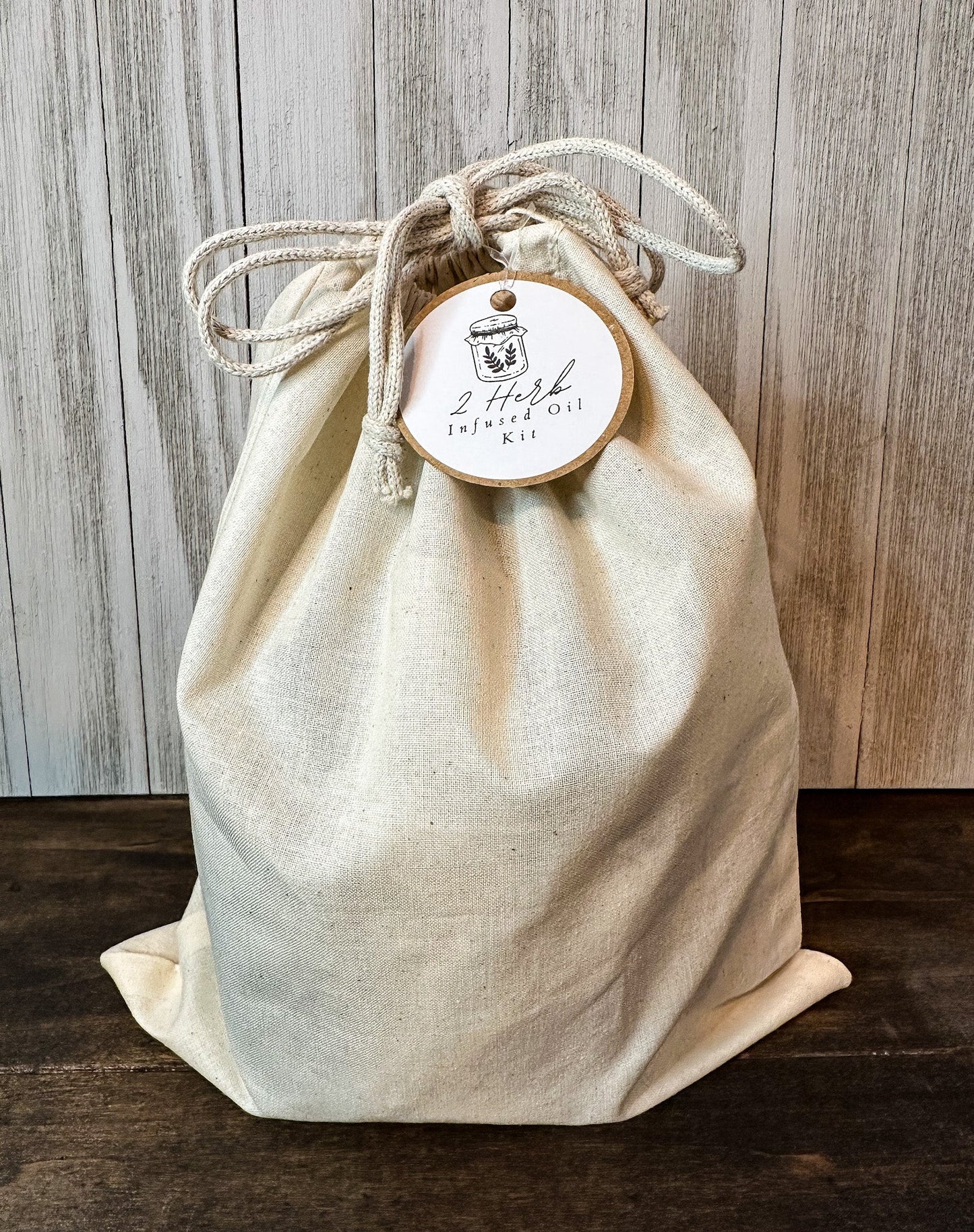 DIY Herbal Infused Oil Kit by HerbalRoseApothecary, includes glass bottles, herbs, and tools for making herbal oils at home.