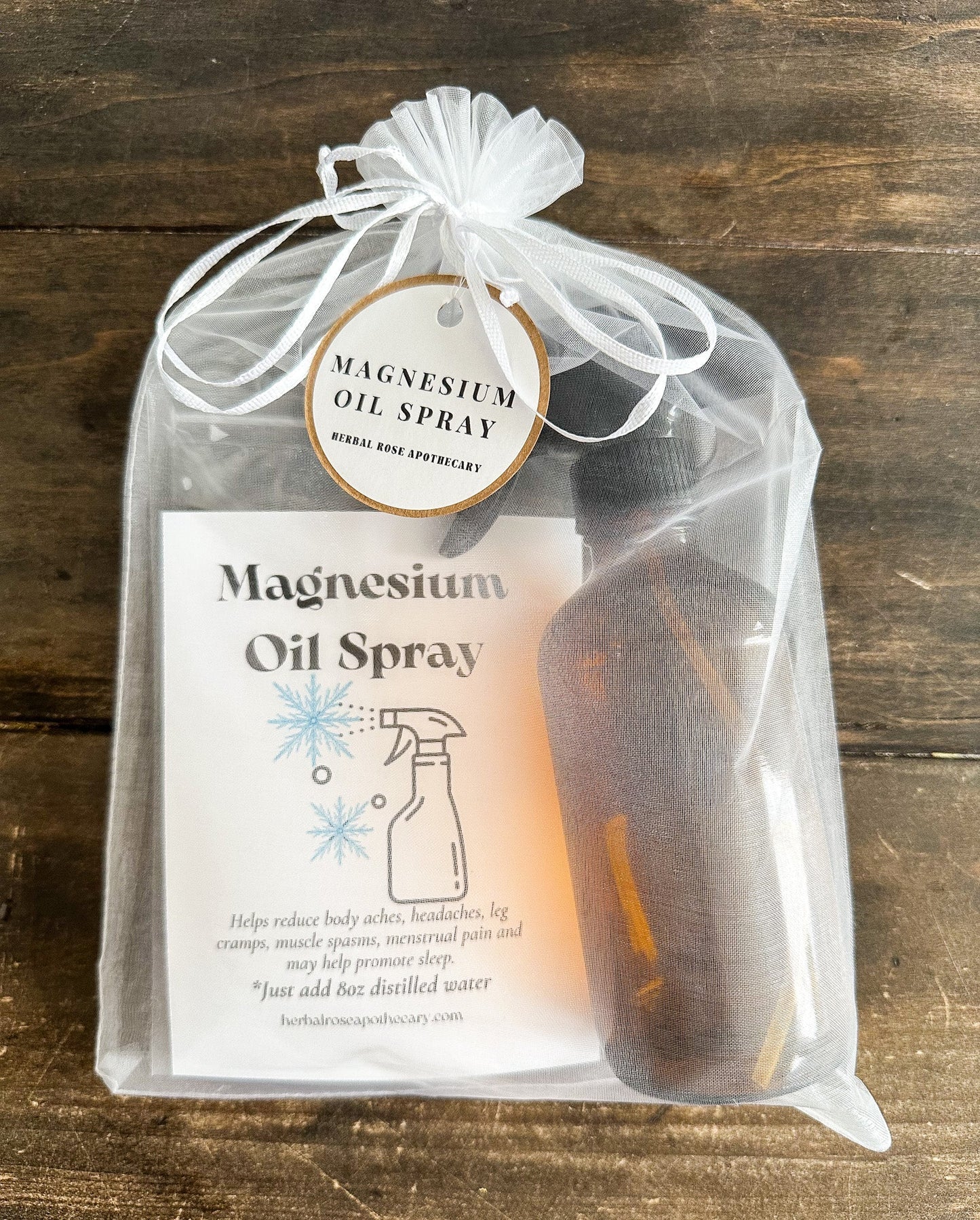 DIY Magnesium Oil Spray apothecary kit by HerbalRoseApothecary, displayed with bottles and ingredients for homemade magnesium oil.