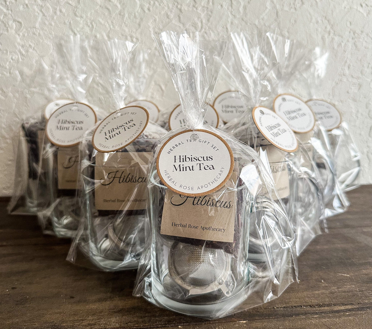 Herbalroseapothecary Hibiscus Mint Tea gift set featuring herbal tea tins with hibiscus and mint for soothing beverage.