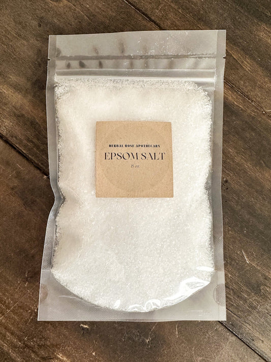 Herbal Rose Apothecary Epsom Salt in salts and oats package, showing white crystalline Epsom salt with herbal oats for relaxing bath use.