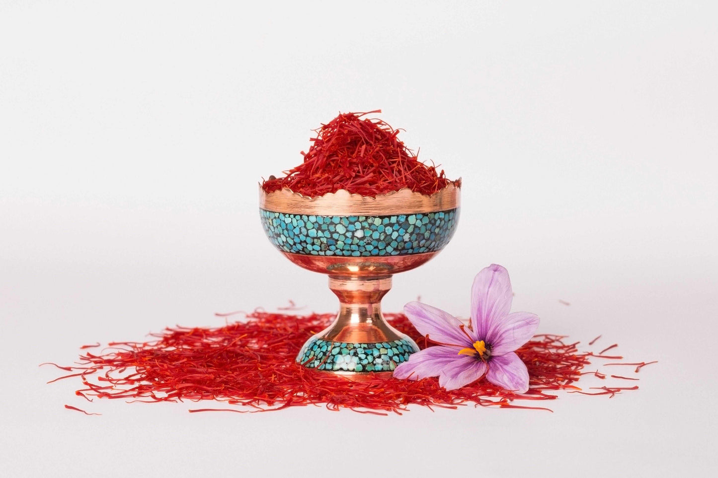 High-quality Saffron Threads in a Tibet chalice, showcasing Super Negin grade from Vanilla Bean Kings with vibrant red threads.