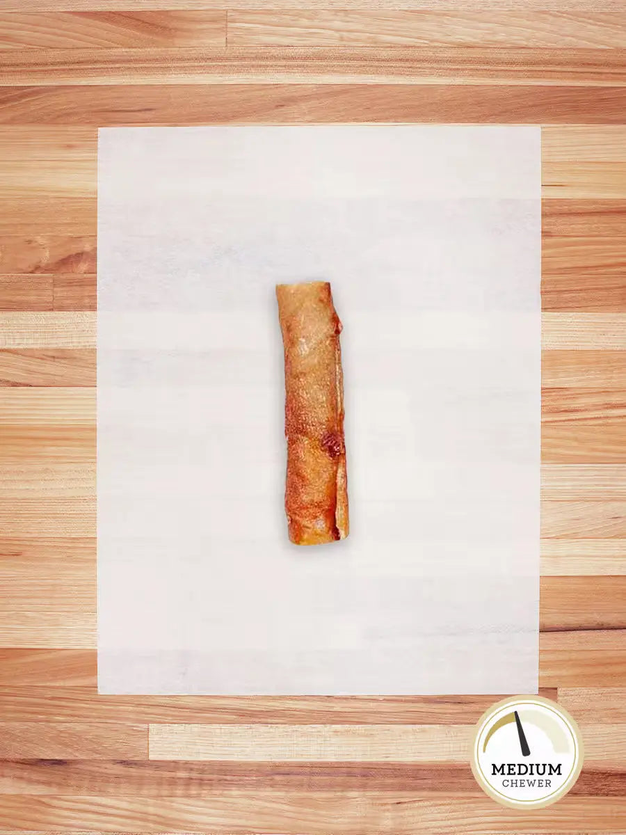 Small hog hide roll from Farm Hounds, showing textured, natural hog hide with rolled edges on a plain background.