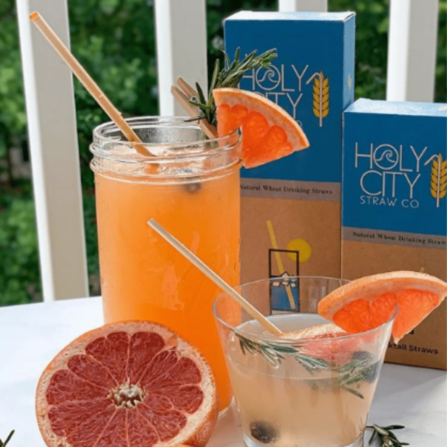 Set of 5.75-inch Holy City Straw Company cocktail wheat drinking straws, eco-friendly and natural for beverages.