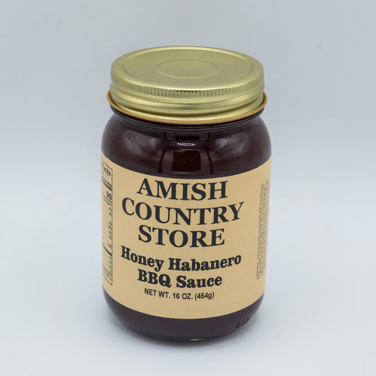 Canned Honey Habanero BBQ Sauce in 16 oz jar from Amish Country Store, featuring a golden honey and spicy habanero blend.