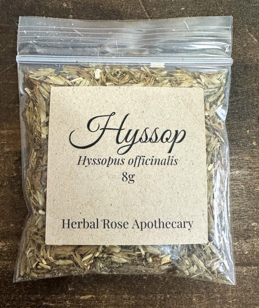 Dried hyssop herbs in an 8g package from HerbalRoseApothecary, showing fresh green leaves and delicate stems.