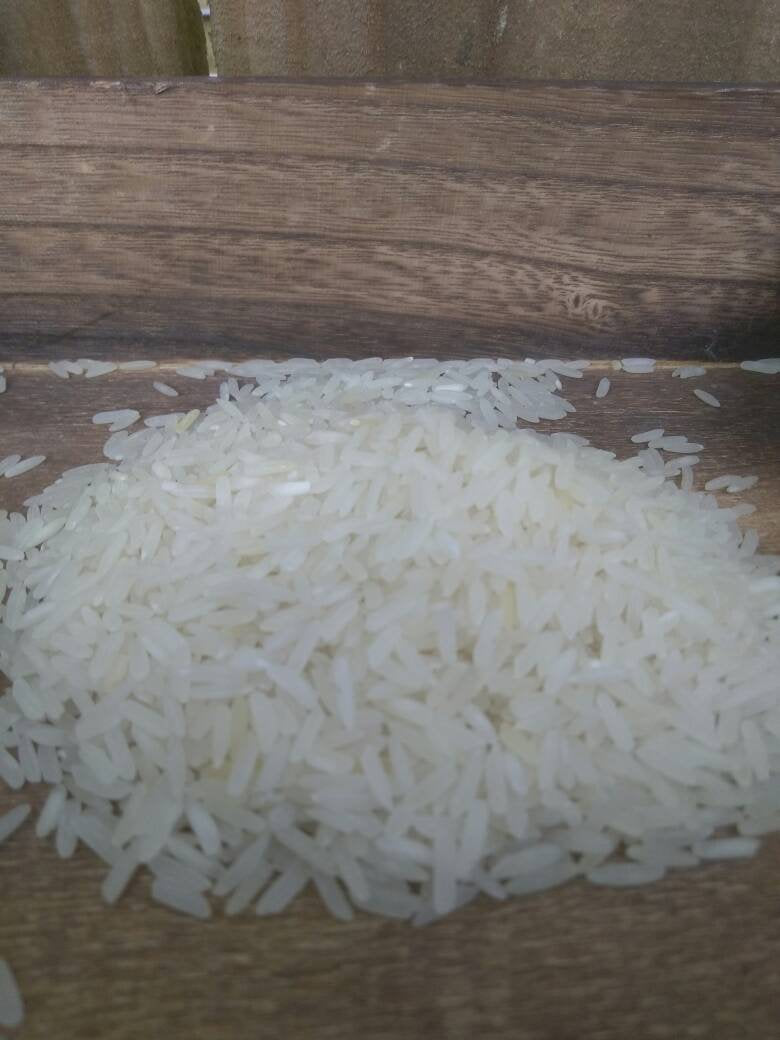 Organic fermented rice water hair rinse by NaturesEgo with ayurvedic black cumin seed oil, natural hair treatment for shine and health.