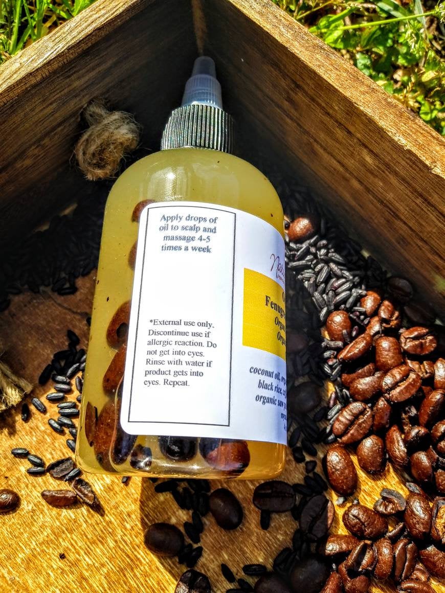Organic Fenugreek Hair Oil elixir from NaturesEgo with black rice, emu oil, and coffee for nourishing hair care.