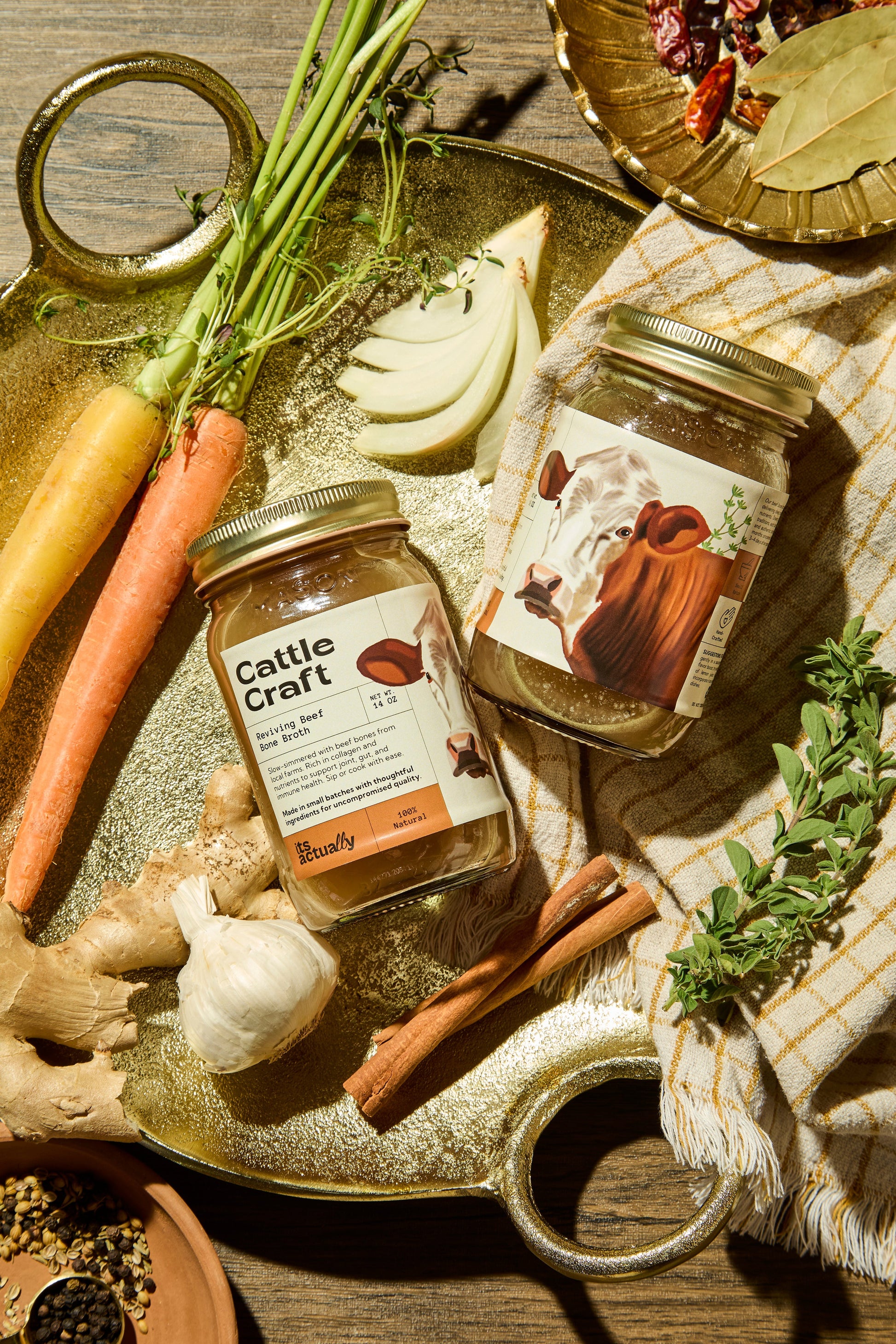 Three packs of Its Actually Co. Reviving Halal Beef Bone Broth in clear packaging, showcasing the product label.