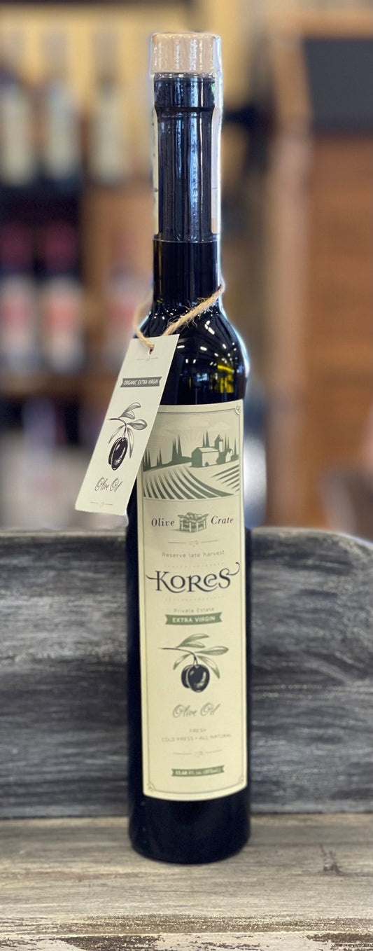 Kores Estate Olive Crate Greek extra virgin olive oil bottle, single estate PDO Manaki EVOO with green and gold label.
