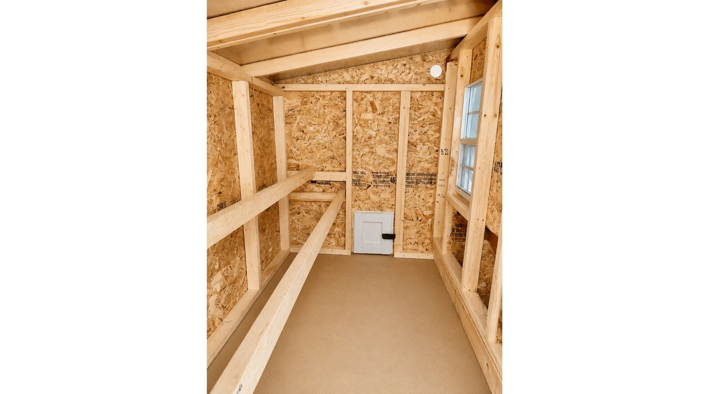 Interior view of the OverEZ large chicken coop designed to house up to 15 chickens, featuring spacious nesting and roosting areas.