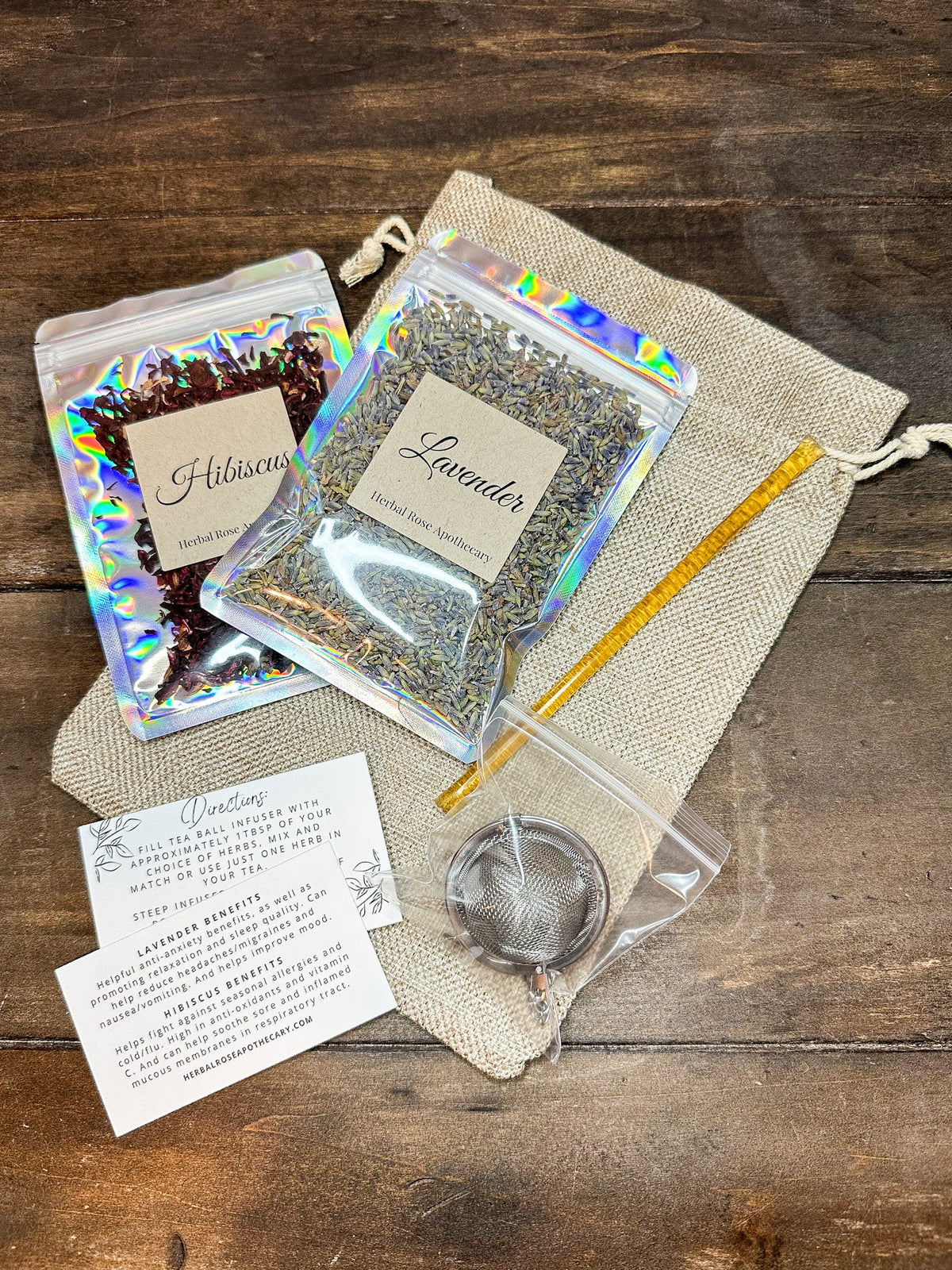 Herbalroseapothecary herbal tea gift bags featuring lavender and hibiscus herbal tea blends in decorative packaging.