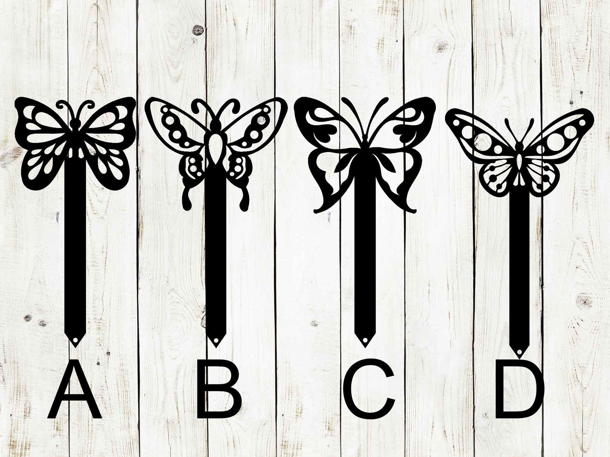 Black butterfly metal yard stake by Lewis Design Company, outdoor garden decor for patio and yard accents.