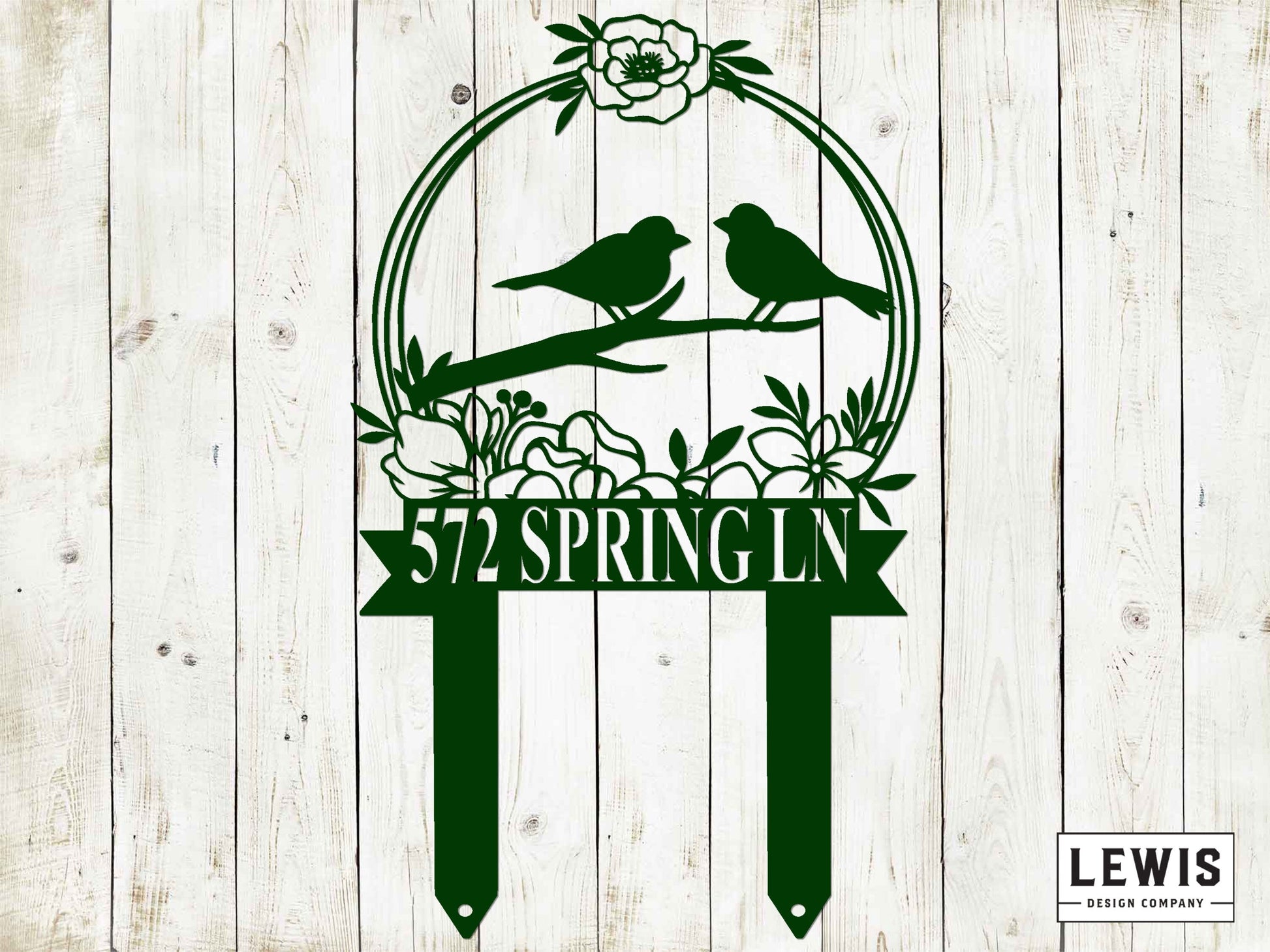 Black metal bird garden stake by Lewis Design Company, outdoor patio and garden art for decorative bird display.