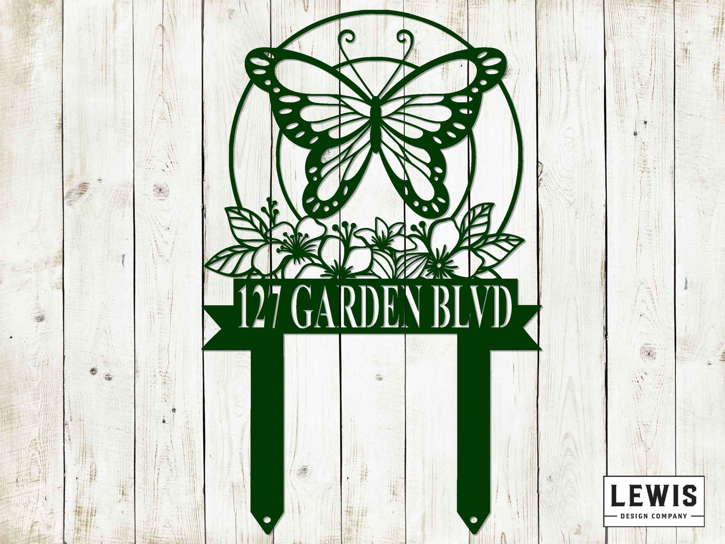 Black metal butterfly garden stake by Lewis Design Company, outdoor patio and garden art for adding charm to outdoor spaces.