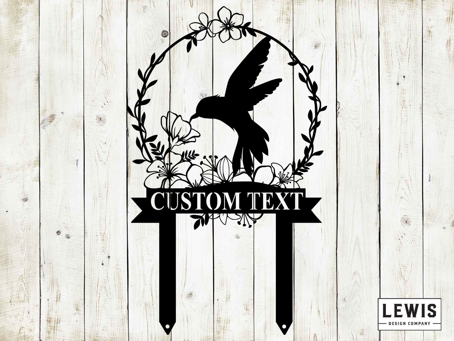 Black metal hummingbird garden stake from Lewis Design Company, outdoor patio and garden art for decorative yard display.