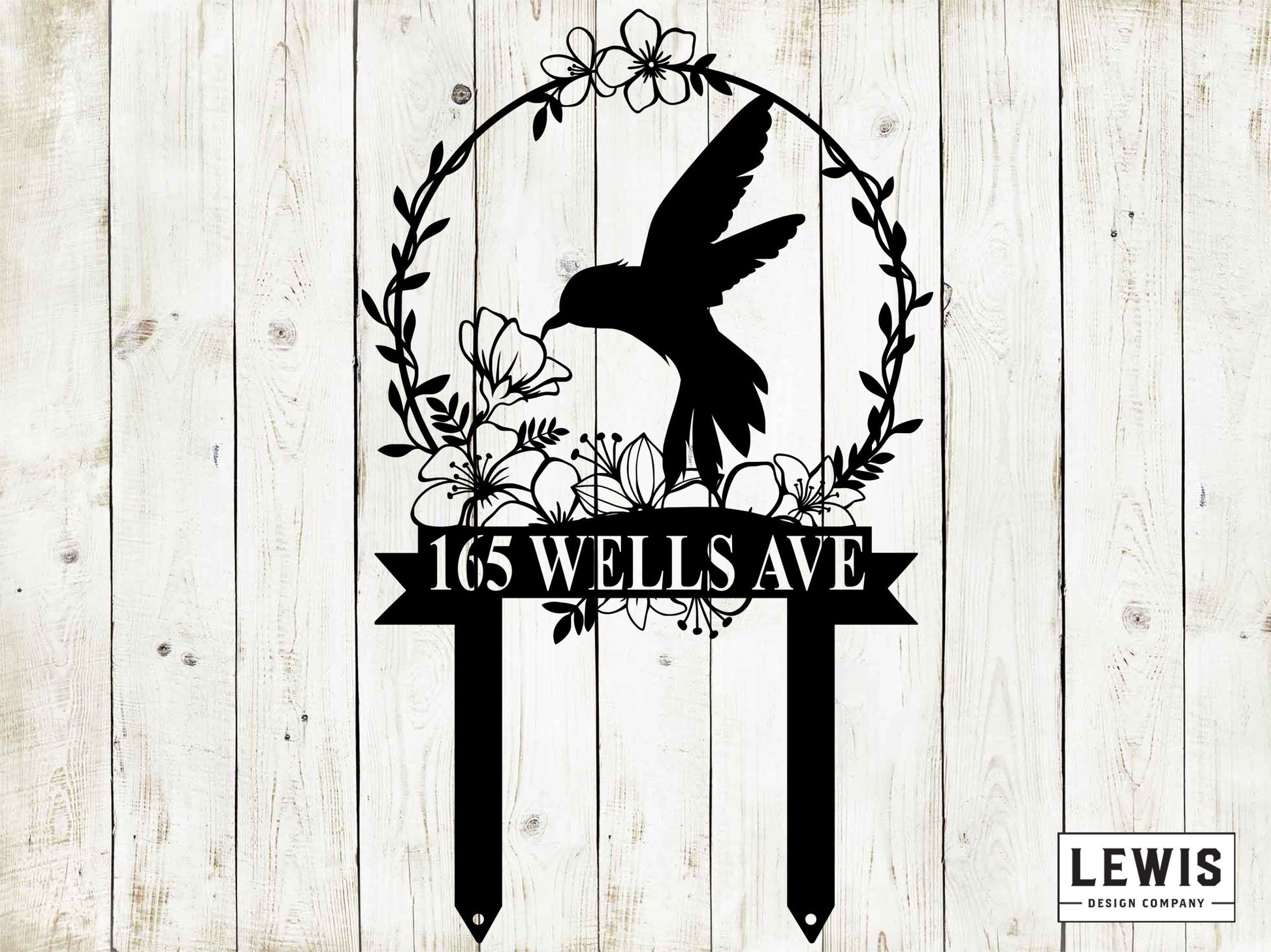 Black metal hummingbird garden stake by Lewis Design Company, 20x12 inches, outdoor patio and garden decor art piece.