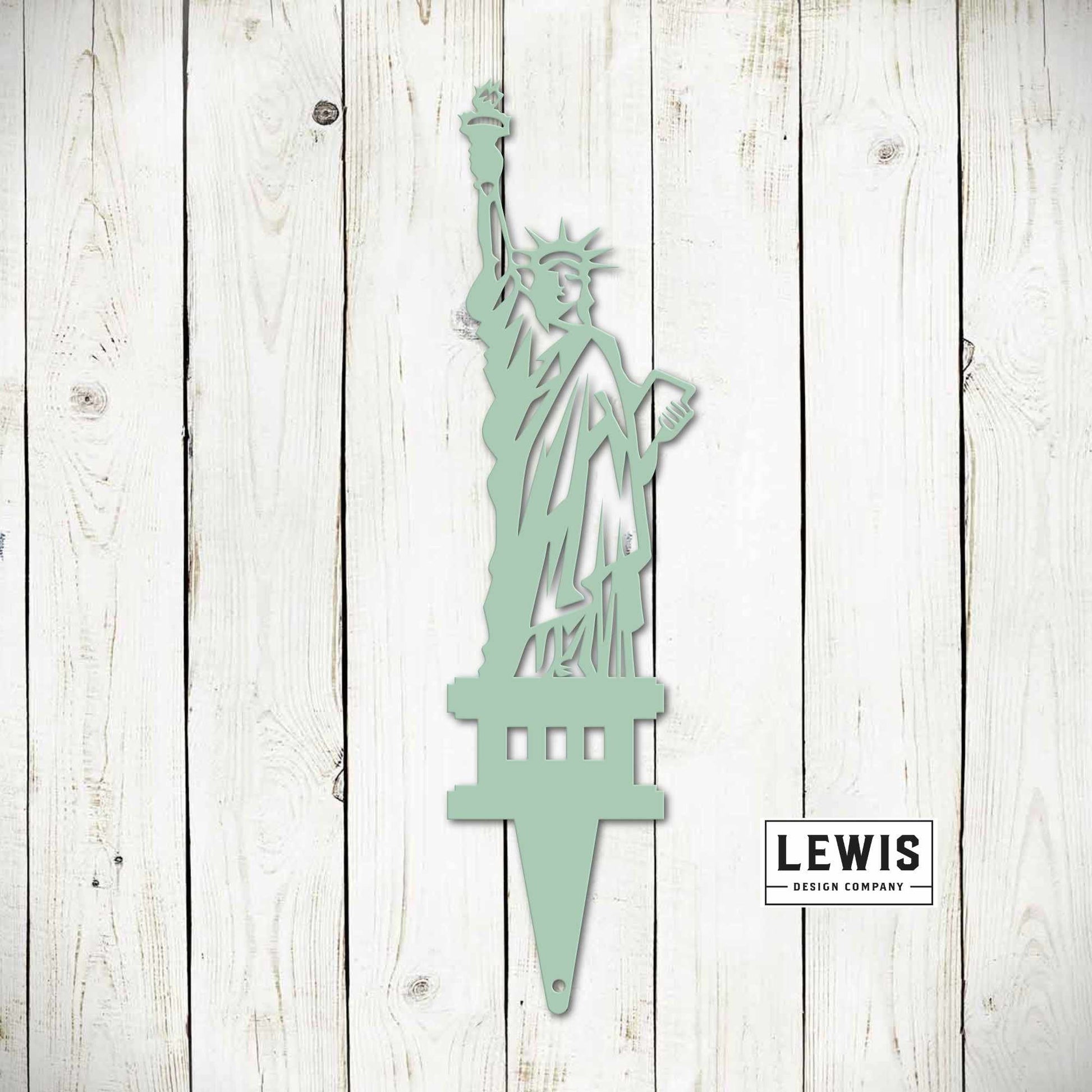 Black Statue of Liberty garden stake with patriotic USA design, metal outdoor yard art for 4th of July and garden decor.