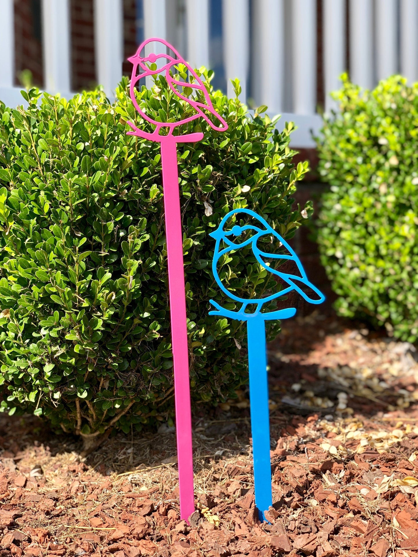 Handmade black bird yard sign from Lewis Design Company, outdoor garden and patio art for yard decoration.