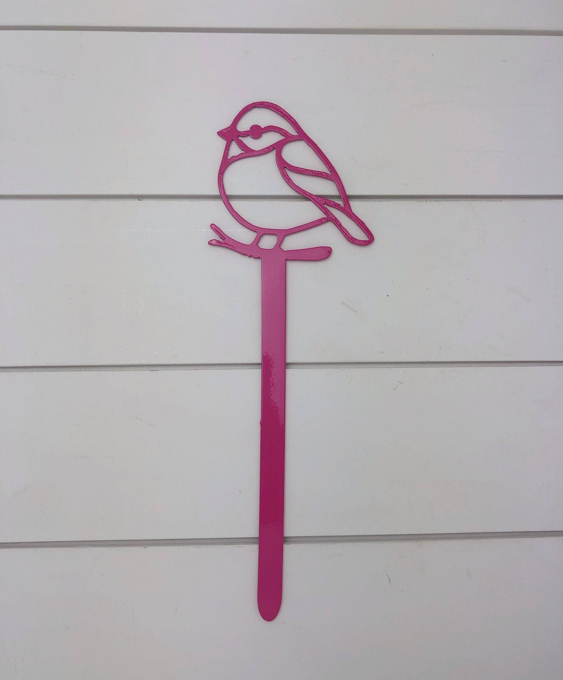 Handmade black bird yard sign from Lewis Design Company, outdoor garden and yard art for patio decor.
