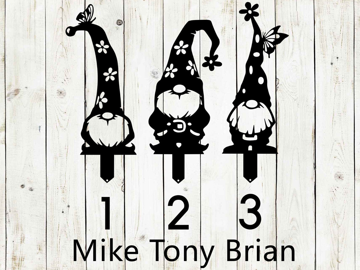 Black metal garden gnome stakes and signs from Lewis Design Company, outdoor patio and garden art for charming garden decor.