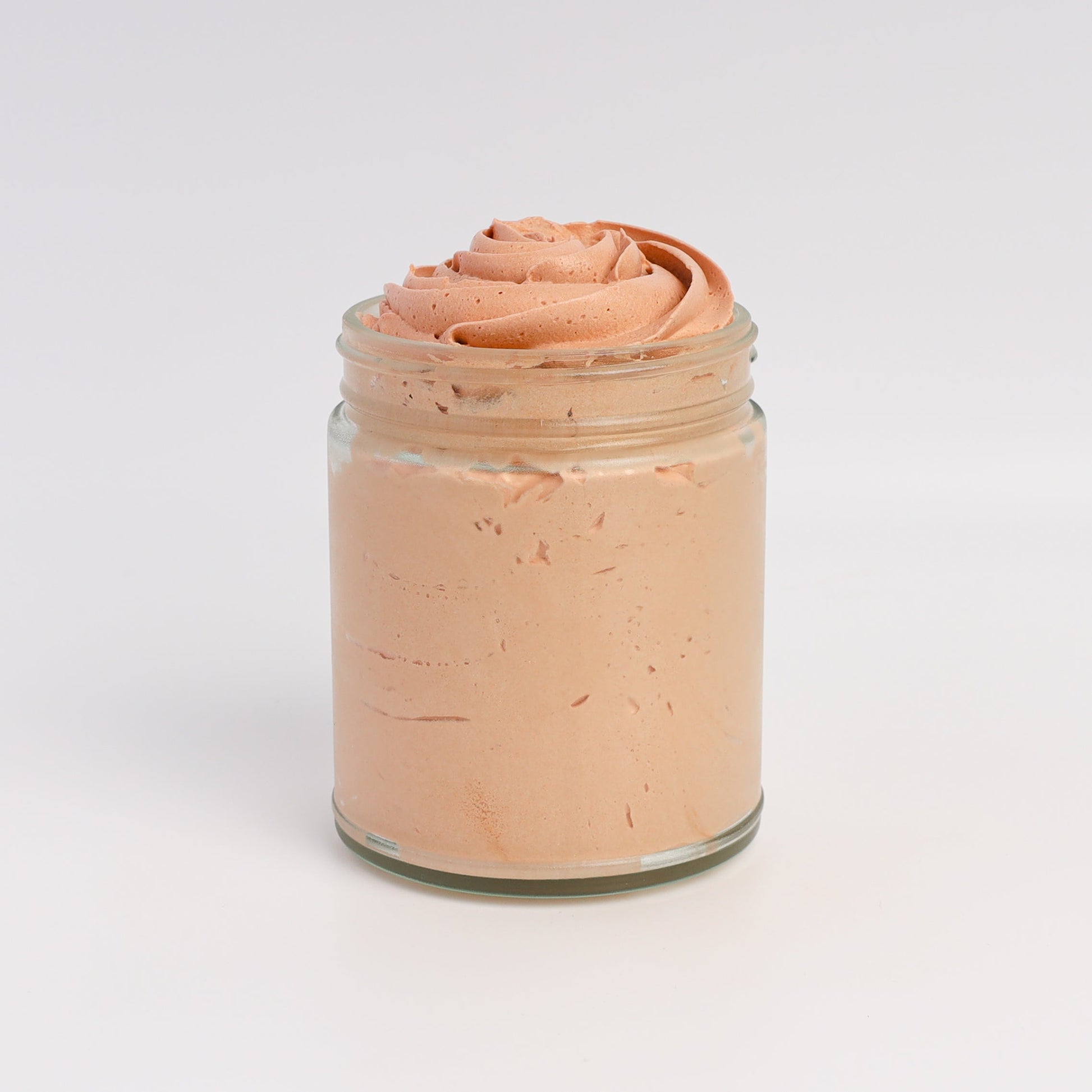 Lady May Tallow luminous bronze whipped body moisturizer in a 9 oz jar, showing the creamy, bronze-tinted body cream with no lid.