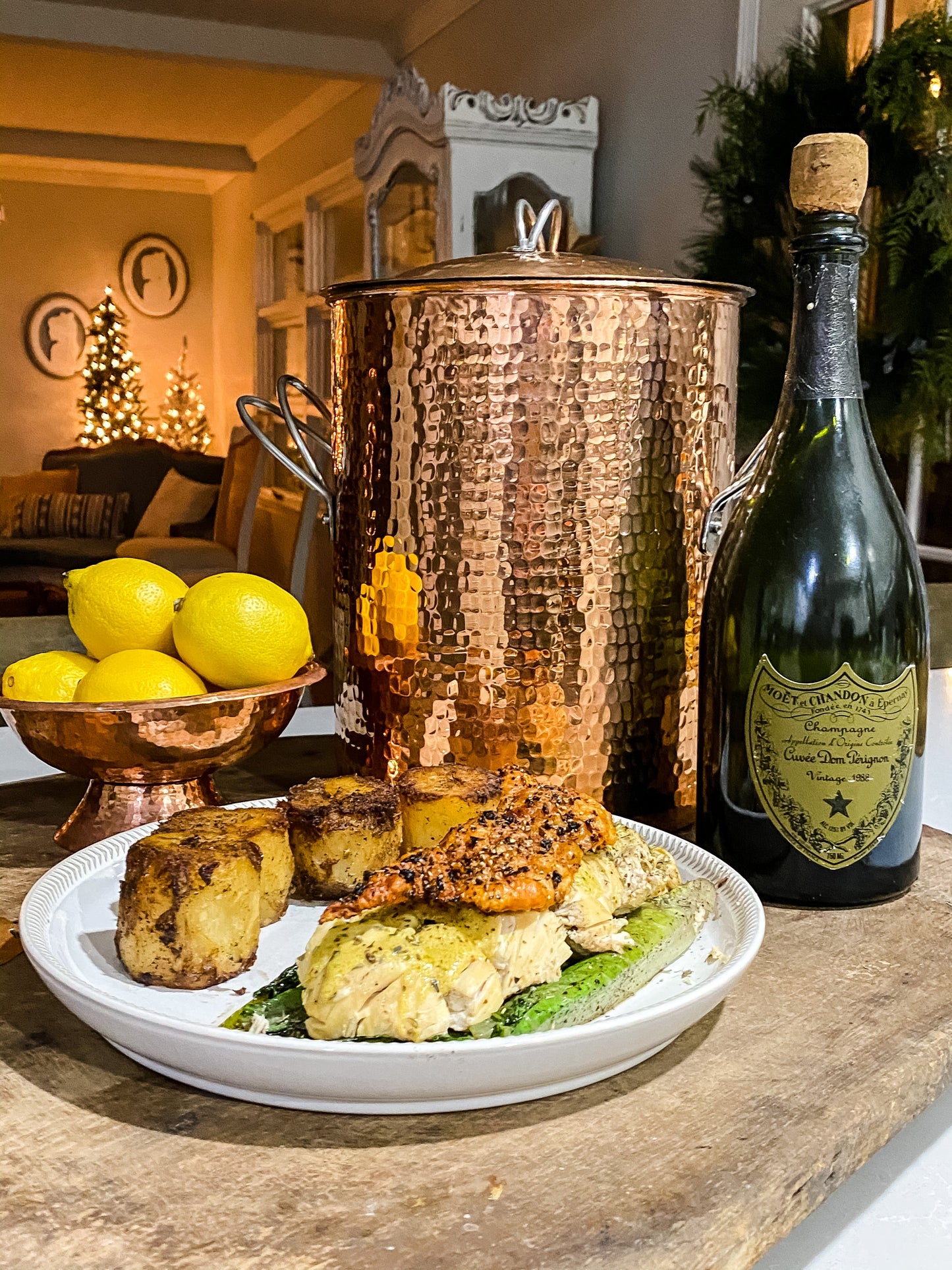 Large copper stock pot by Sertodo with polished finish, ideal for cooking soups and stews, shown on a kitchen countertop.