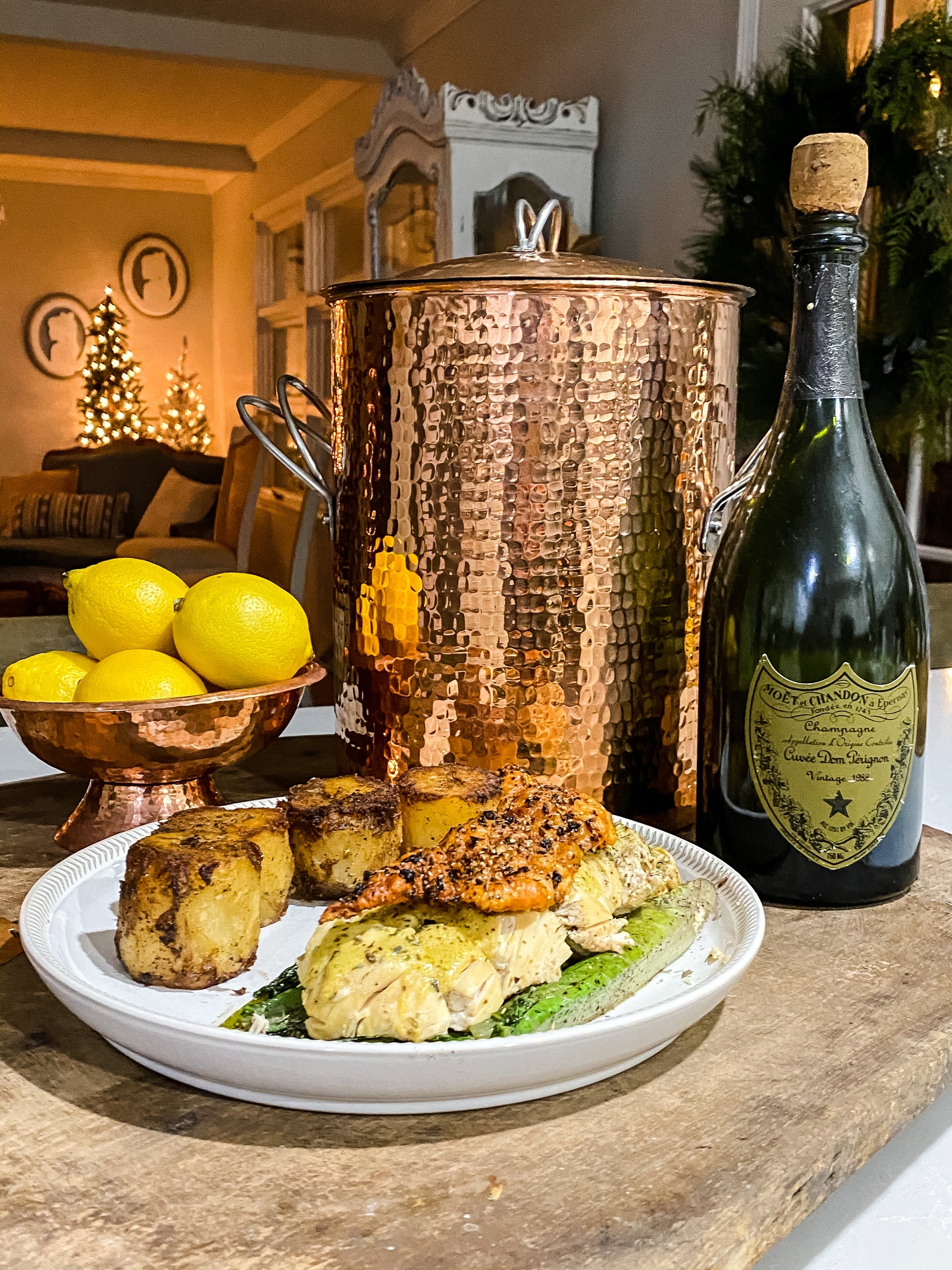 Large copper stock pot by Sertodo with polished finish, ideal for cooking soups and stews, shown on a kitchen countertop.