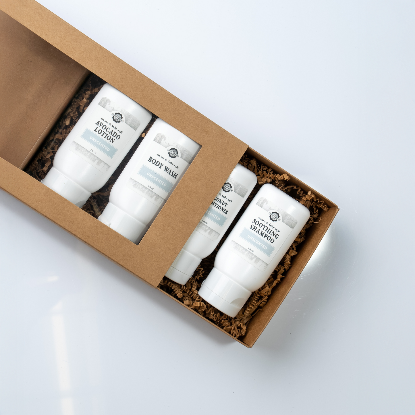 Rustic Strength Mama and Baby Travel Kit with 2 oz bath and body products, including bottles for gentle skincare on the go.