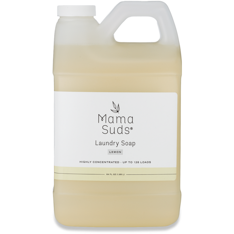 MamaSuds Laundry Detergent Soap is a nontoxic, lemon-scented laundry soap made with natural ingredients. It comes in a white-labeled plastic jug with black and gold text, a clear handle, and pale yellow liquid for an eco-friendly clean.