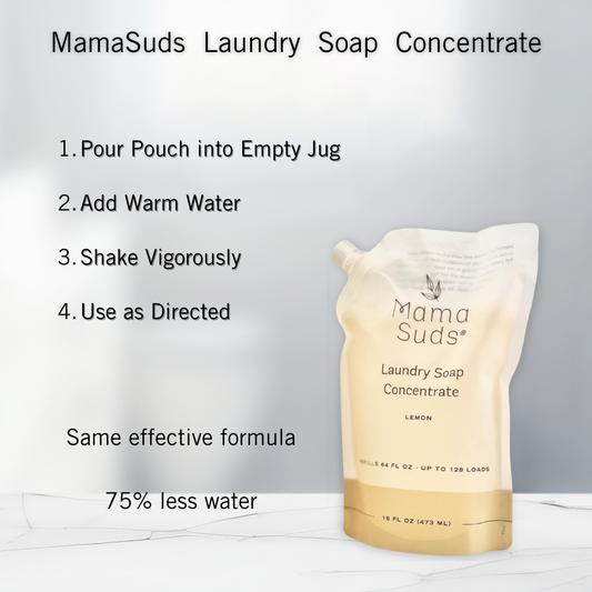 A recyclable MamaSuds Laundry Soap Concentrate Pouch stands on a white surface. Directions above: pour into a jug, add warm water, shake, and use. Made with 75% less water and the same effective formula.