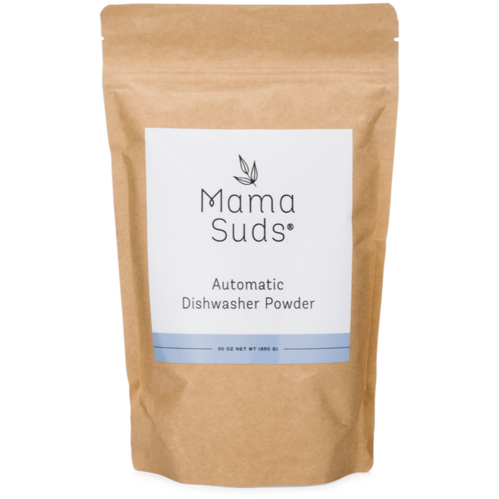 A brown paper pouch with a white label reading “MamaSuds Automatic Dishwasher Powder | Nontoxic and Eco-Friendly.” This 30-ounce (850g) eco-friendly, non-toxic powder stands upright.